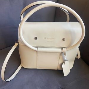 Excellent Condition.  Carry 2 ways as a handbag or across your shoulder.